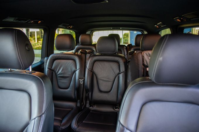 Leather seating in a nine-seater Mercedes van, private group transfer Malaga Airport to Gibraltar